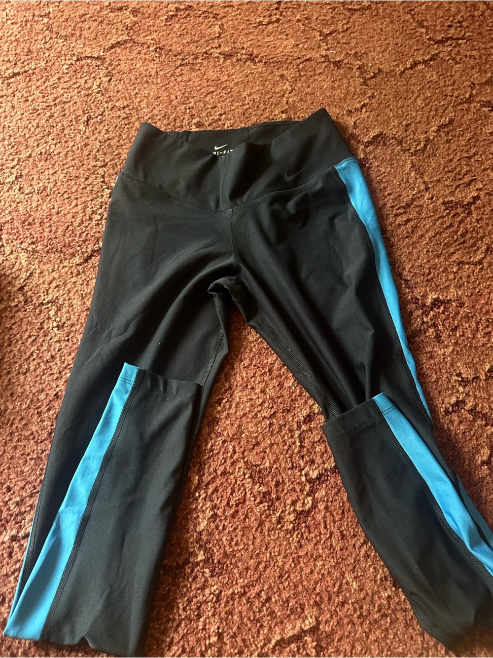 Nike Kids Black Leggings with Bright Blue Side Panels